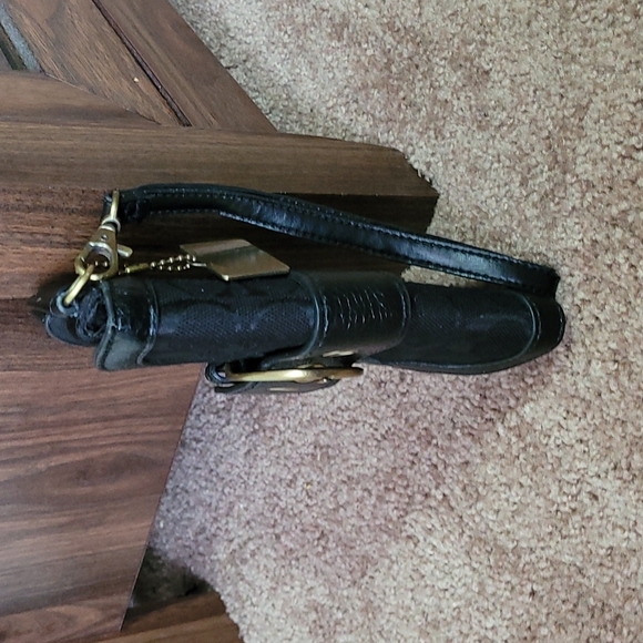 - Coach wristlet black super cute large enough for phone. - Picture 3 of 16